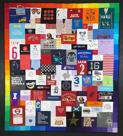 Ombre border on T-shirt quilt with a border by Too Cool T-shirt Quilts